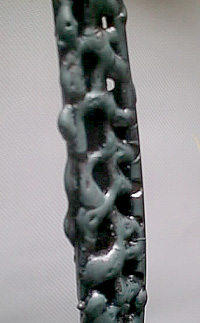 detail meuble de createur acier sculpté